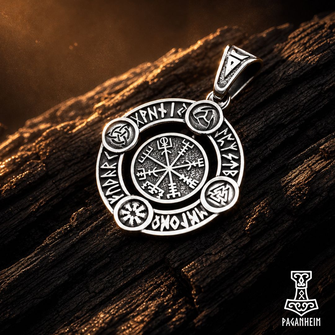 Stainless steel pendant with rotating compass design and polished finish
