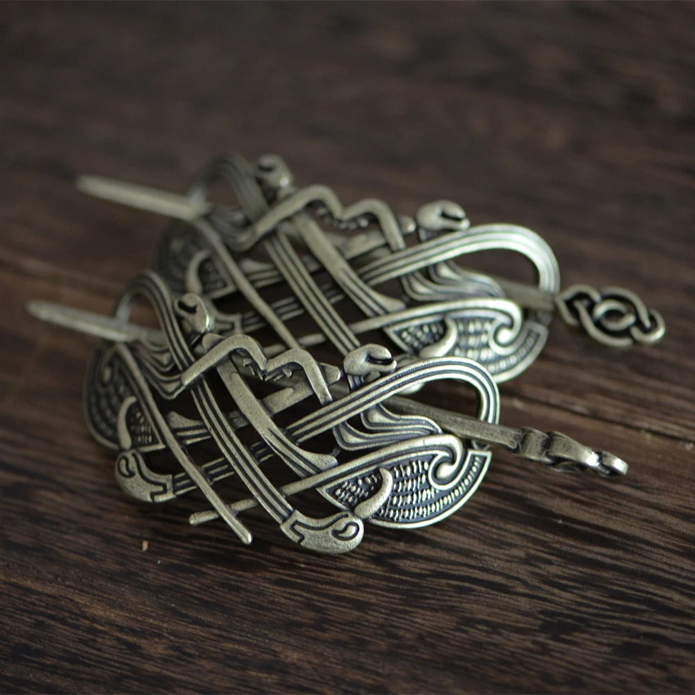 Ringerike-style Norse hair pin featuring elegant raven head motifs.