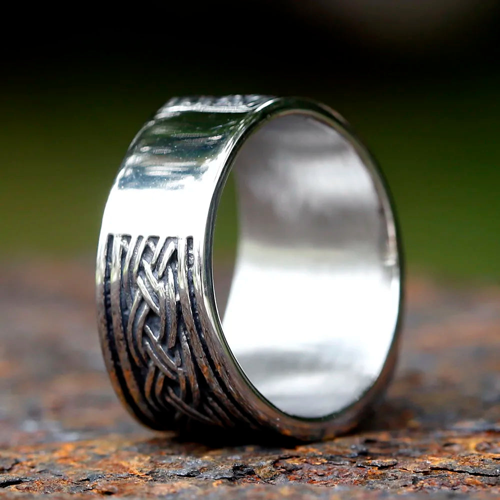 Viking ring with Mjölnir, skull, and extended Web of Wyrd pattern