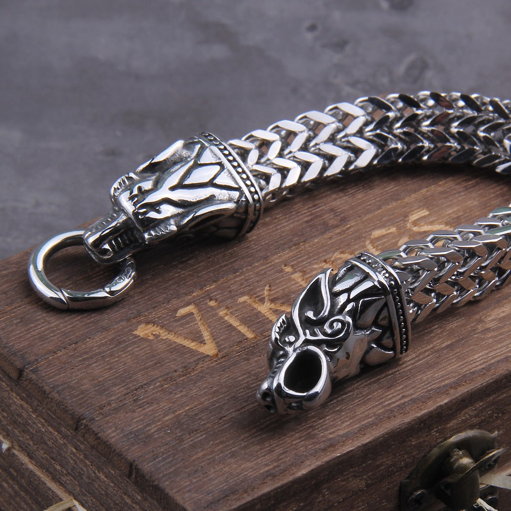 Immerse yourself in the enchanting world of Fenrir's sons, Sköll & Hati, with this lunar Cuban Chain bracelet. Crafted with attention to detail, the celestial pursuit of Sól and Mani unfolds in stainless steel links, making it a captivating addition to any jewelry collection, especially for Viking and Pagan enthusiasts.