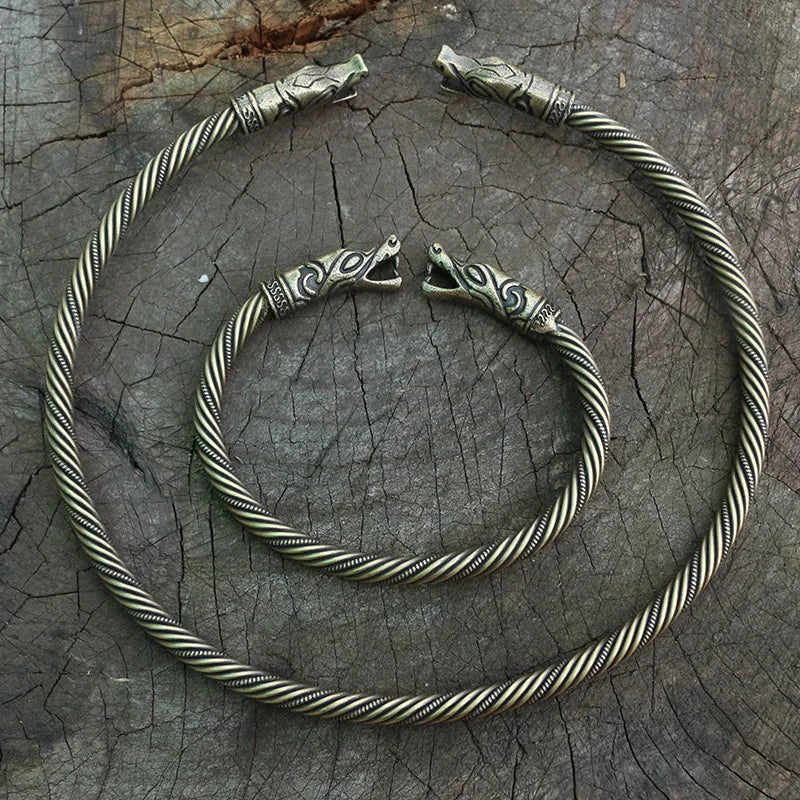 Bronze-tone Norse neck ring featuring twisted pattern and serpent heads