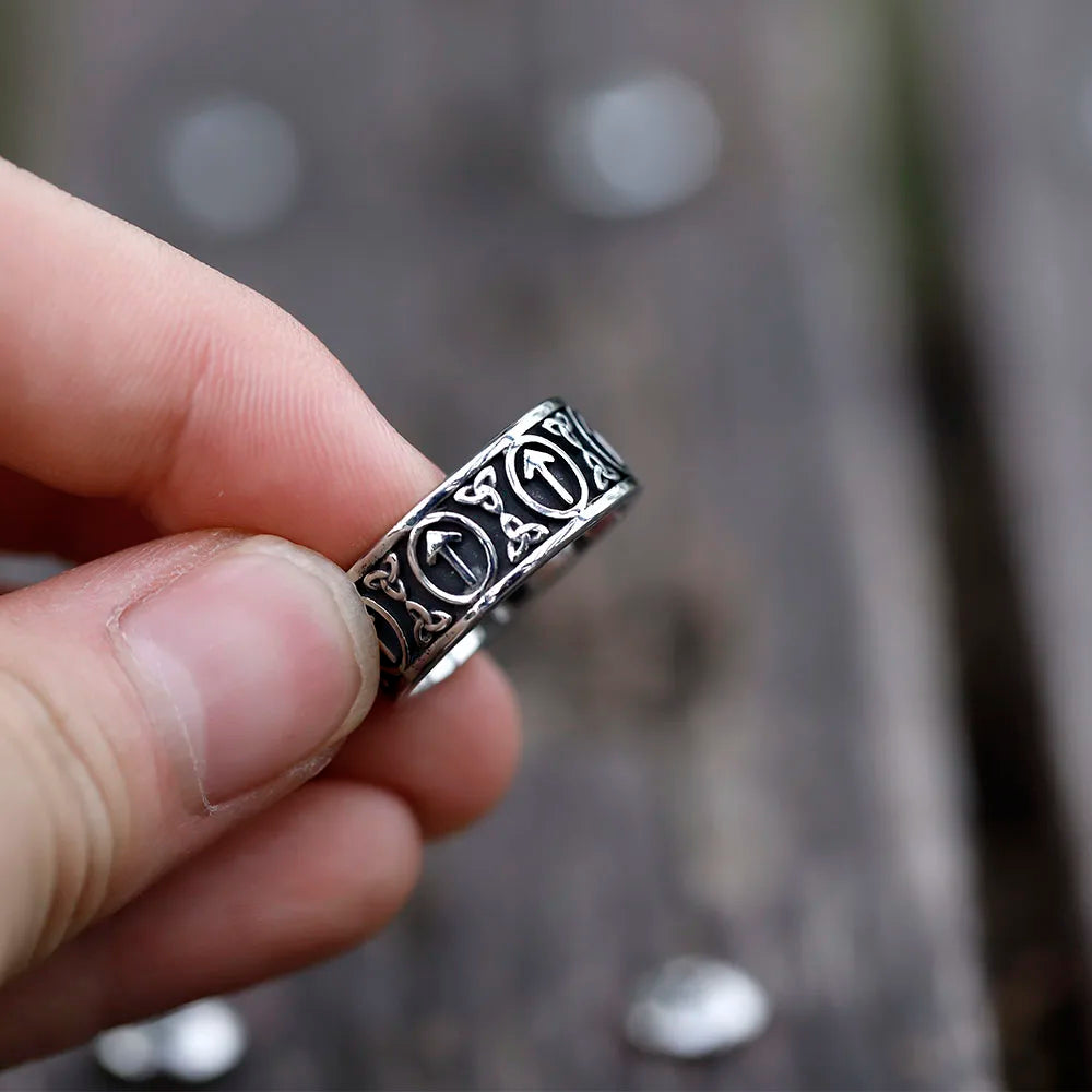 Norse rune ring showing Tiwaz and triquetra details