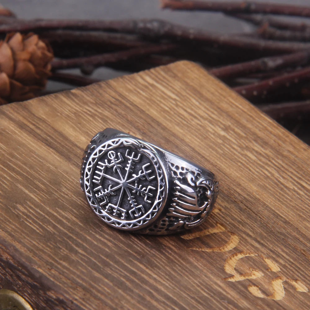 Intricately designed ring with a Vegvisir emblem and Viking longship.