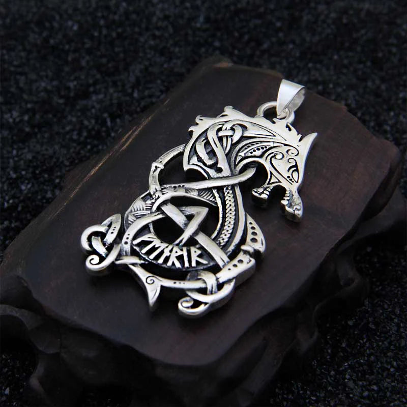 Viking pendant featuring Ringerike patterns and Norse runes.