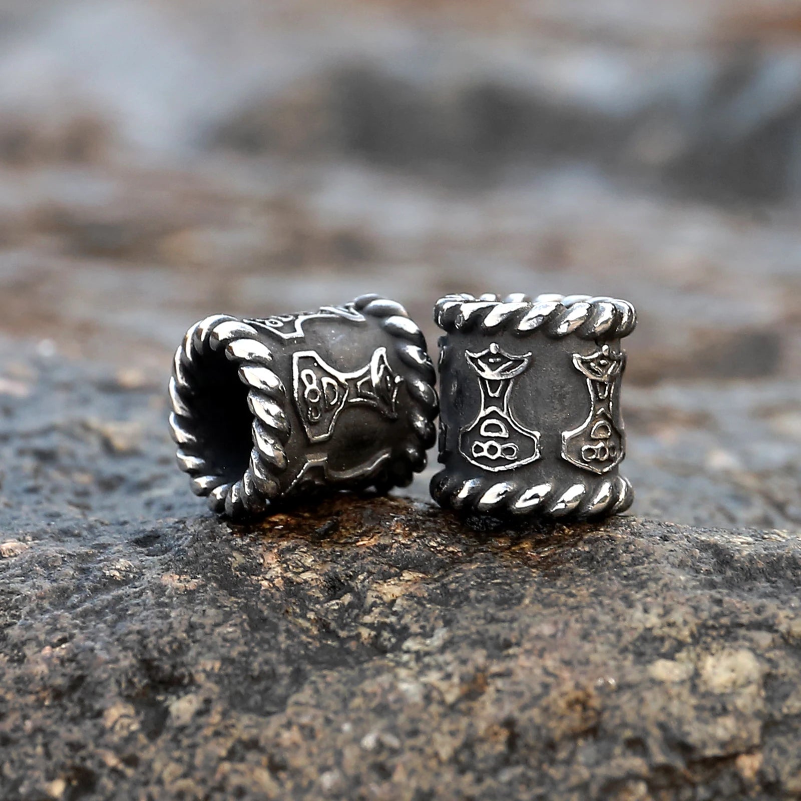 Norse Mjölnir beads with Thor’s hammer symbol.