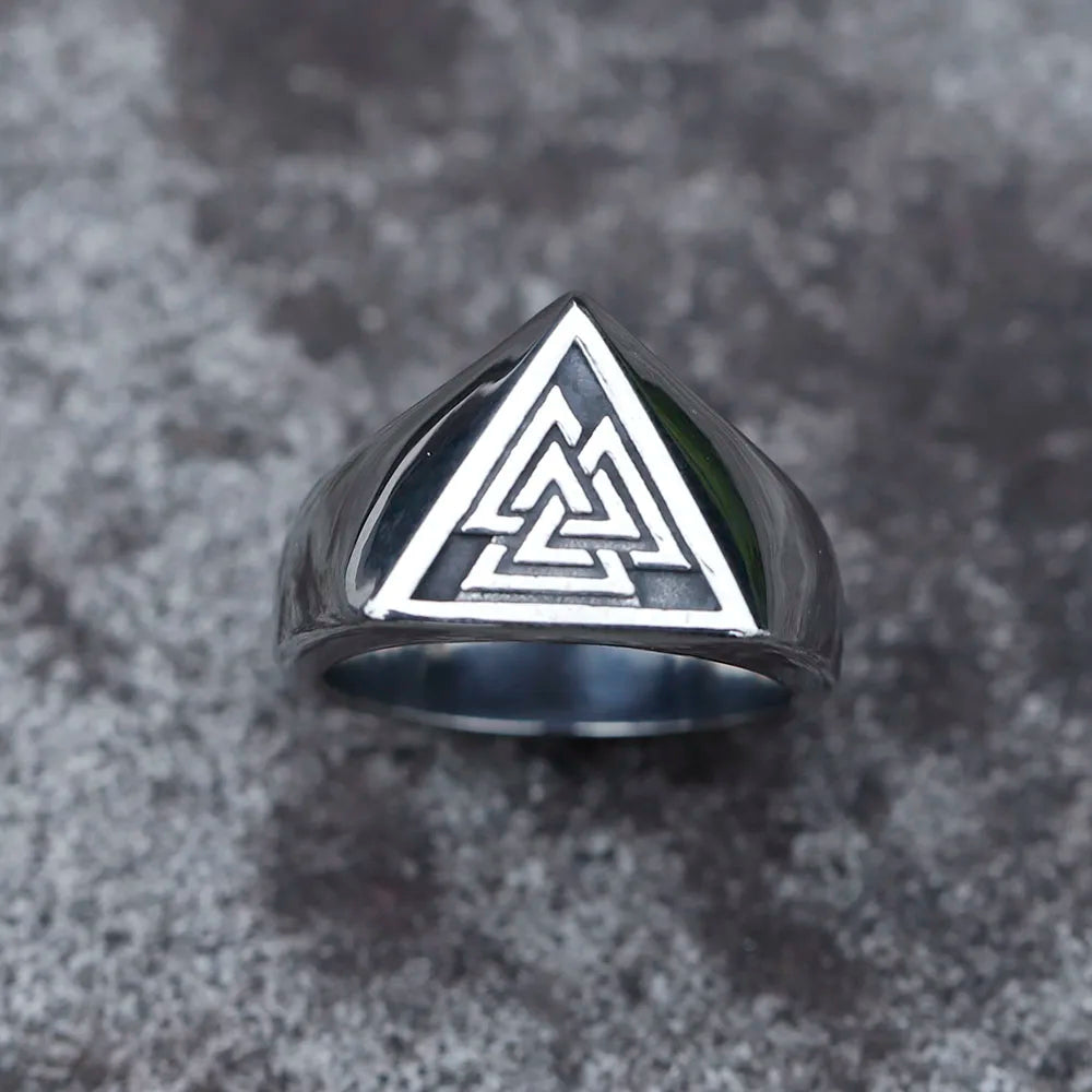 Norse-inspired ring with engraved Valknut crown and silver finish