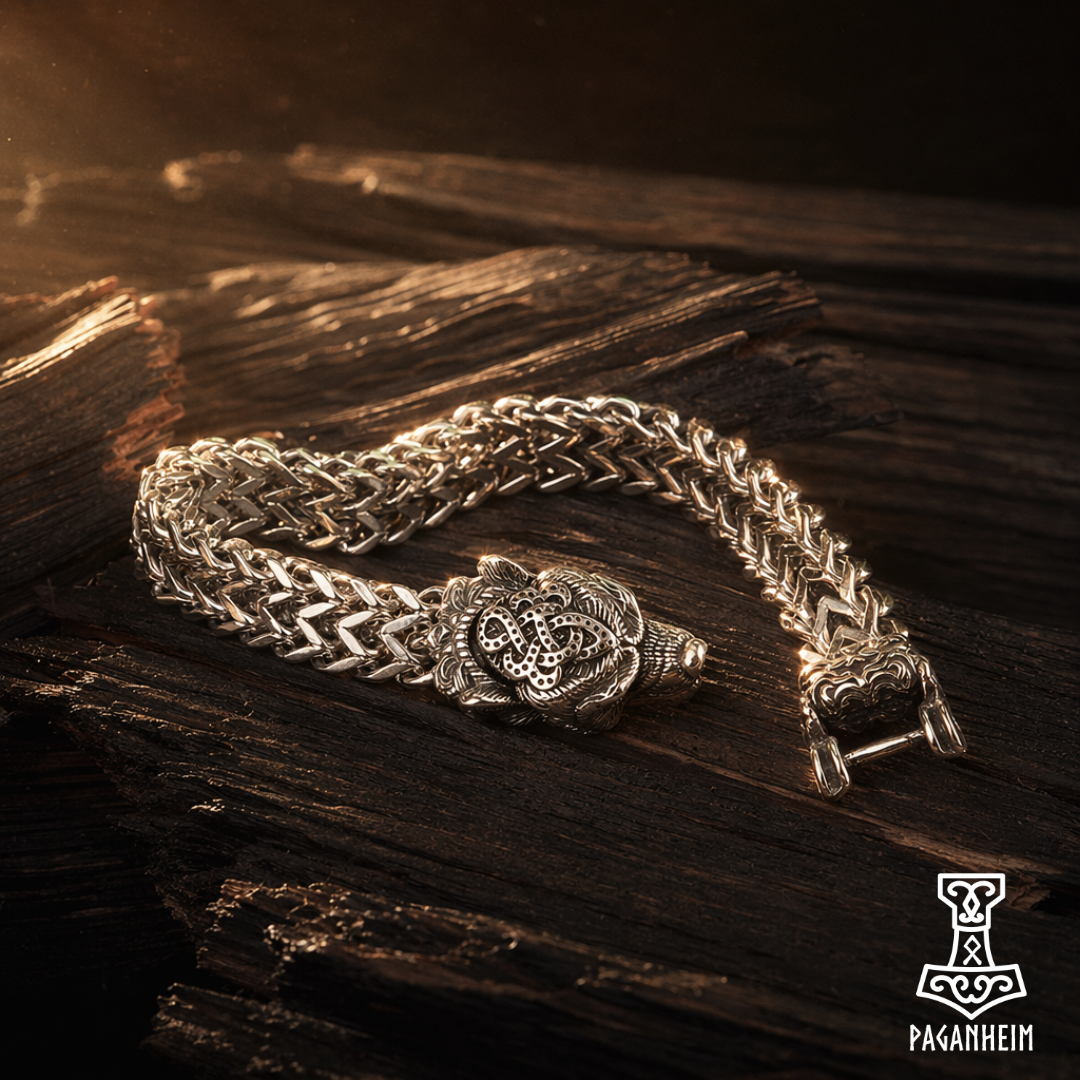 Stainless steel bracelet with a bear‑head clasp on a heavy curb chain.