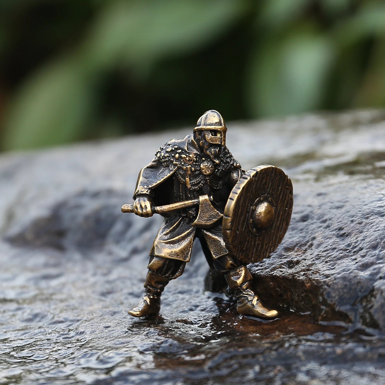 Norse warrior bead featuring a Gjermundbu-style helmet and detailed weaponry.