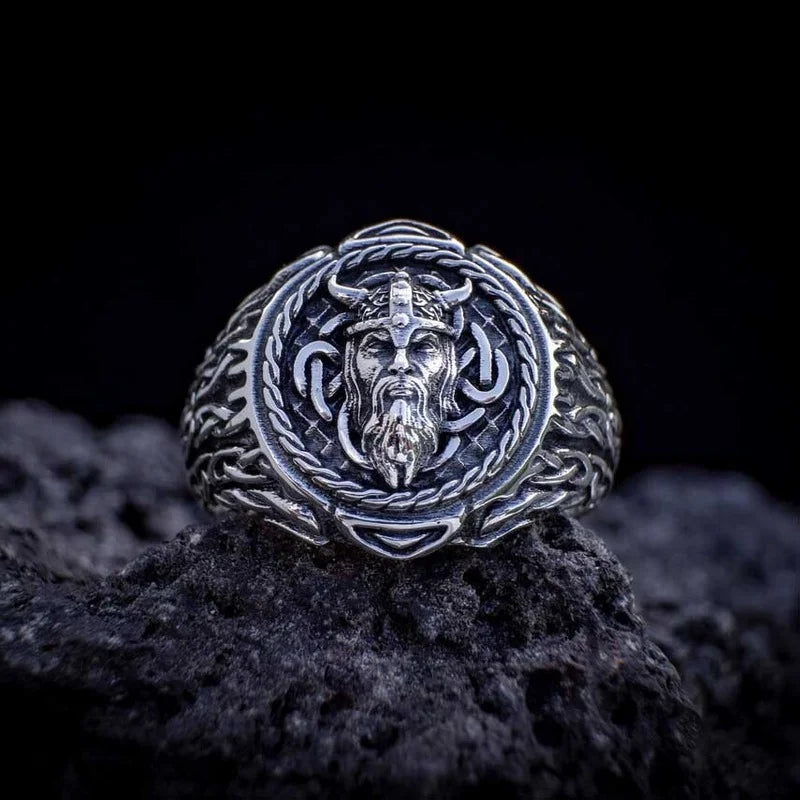 High-quality stainless steel ring featuring the face of a Viking warrior surrounded by Web of Wyrd patterns symbolizing fate.