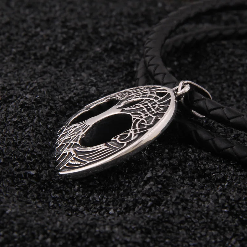 Silver necklace featuring the World Tree Yggdrasil and interwoven Norse patterns.