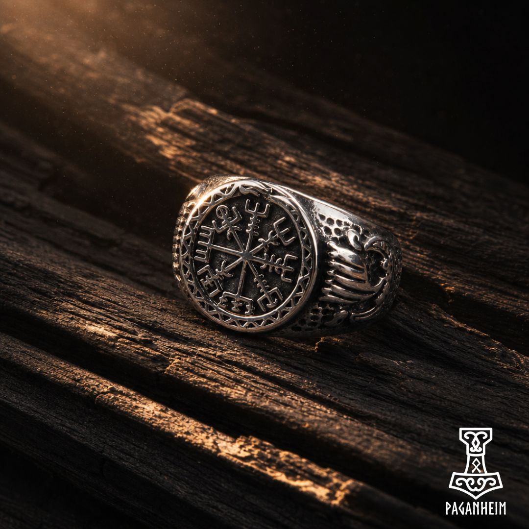 Silver ring featuring Vegvísir symbol engraved on crown.