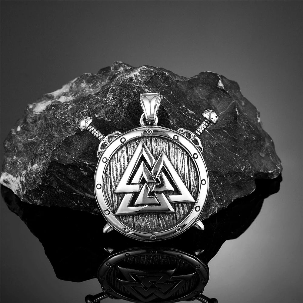 Shield pendant with Odin’s Valknútr and battle swords.