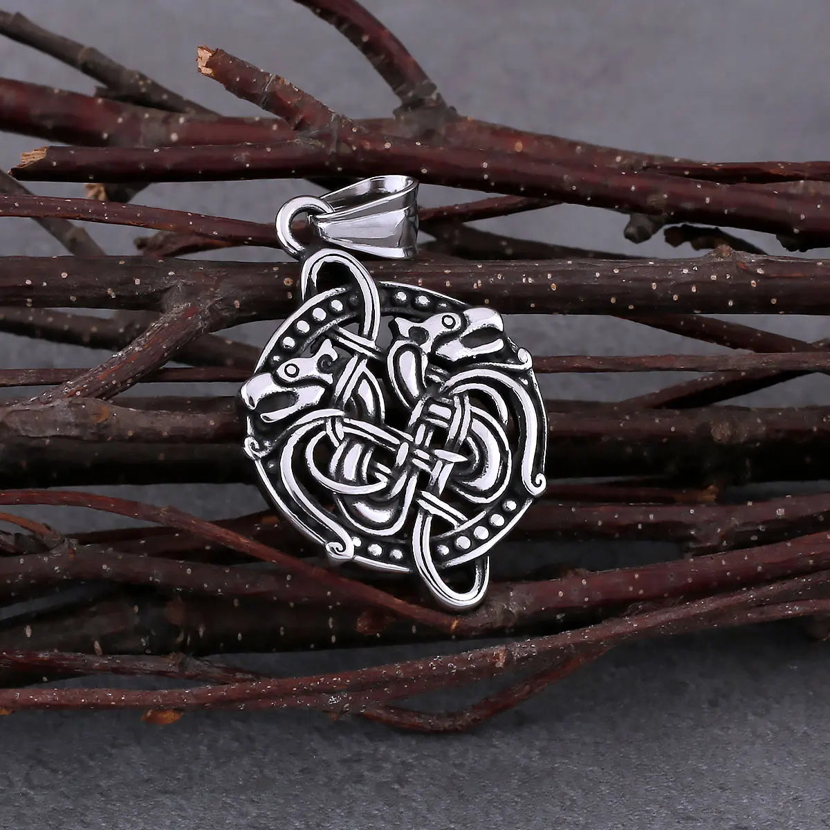 Viking-inspired necklace with intertwined serpent pendant in Jelling style.