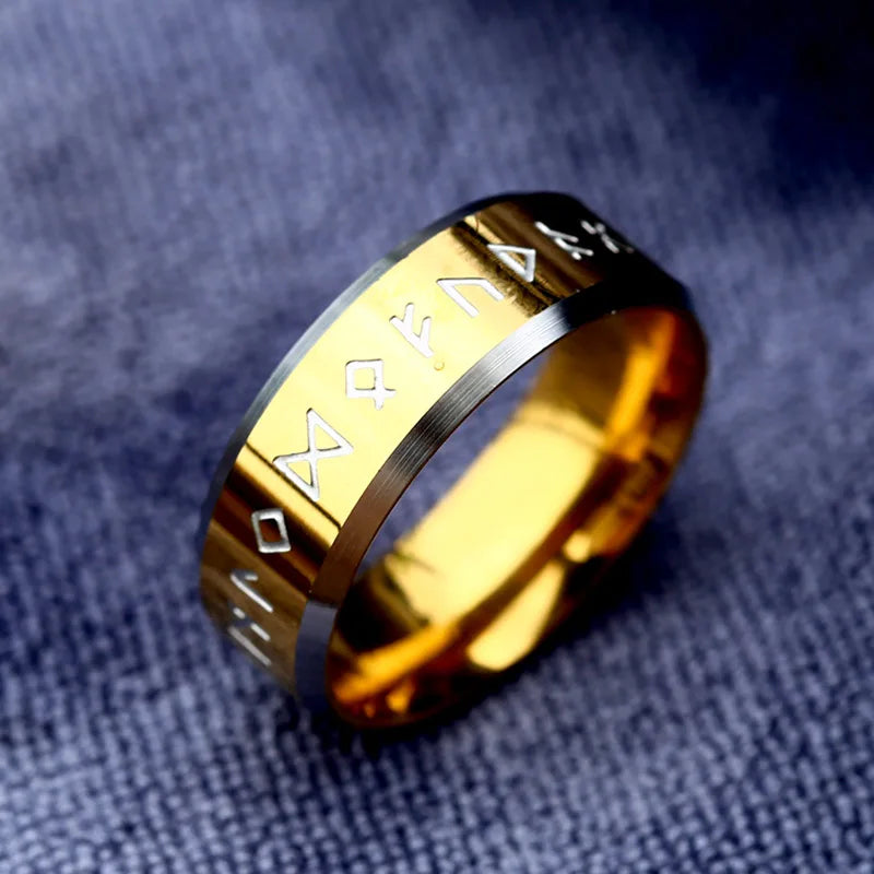 Polished gold ring featuring Elder Futhark rune etching