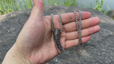 Viking necklace symbolizing wisdom and power of the dragon.