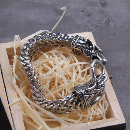 Embrace the mythical strength of Norse legends with our Cuban Chain wolf bracelet. The split ring, echoing the Binding of Fenrir, adds symbolic depth to this stainless steel jewelry piece. Ideal for those passionate about Scandinavia, Viking lore, and Old Norse aesthetics.