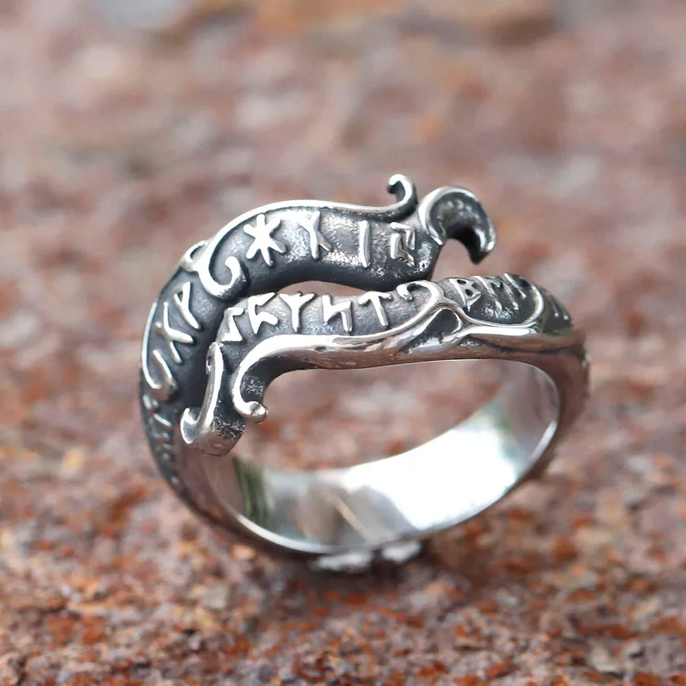 Ancient Germanic rune ring with unique curving patterns and design.