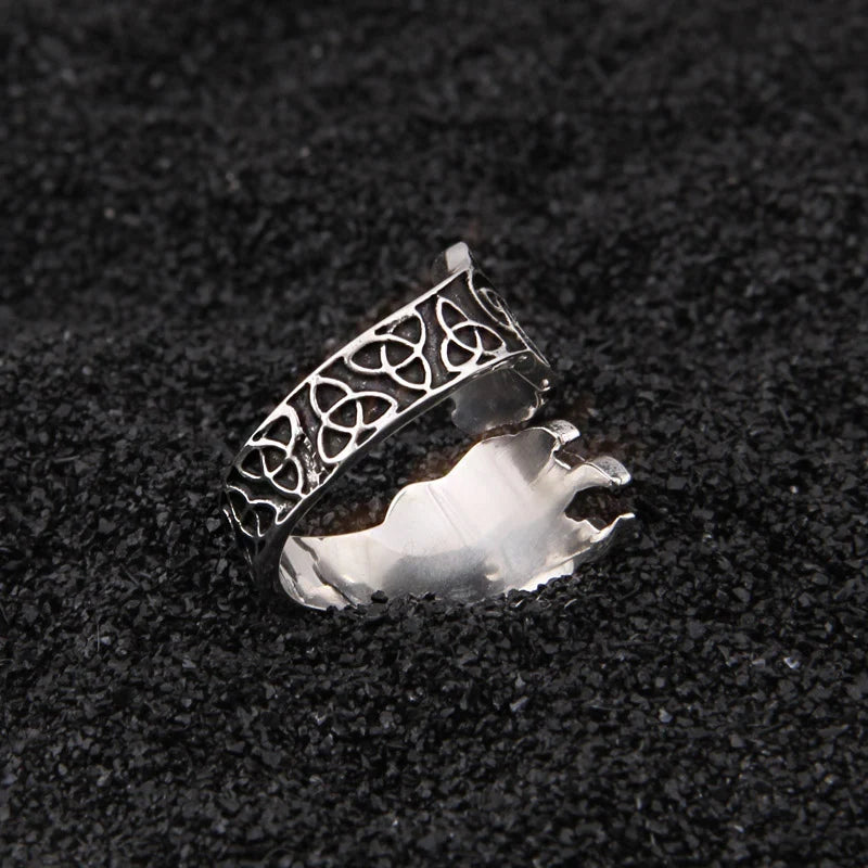 Adjustable sterling silver bear claw ring with intricate Celtic patterns