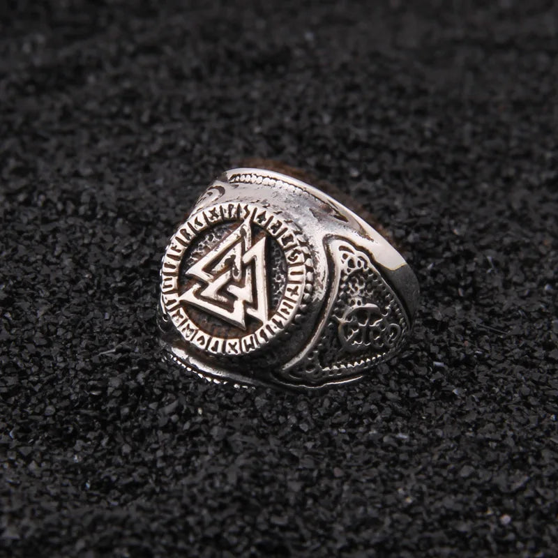 Viking-style ring featuring the Valknut symbol surrounded by Norse runes.