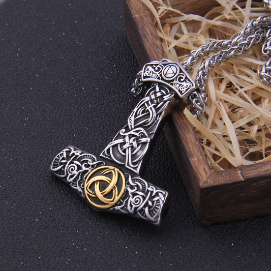 Choose the Triquetra Mjolnir Amulet with the symbol in either silver or gold, adding a personalized touch to your Norse-inspired jewelry collection.