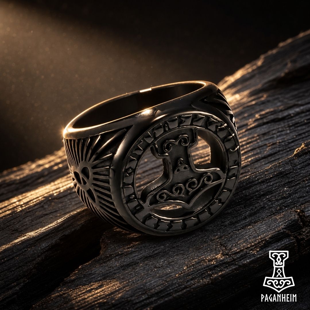Silver and black Thor’s hammer ring showing detailed openwork crown and side engraving