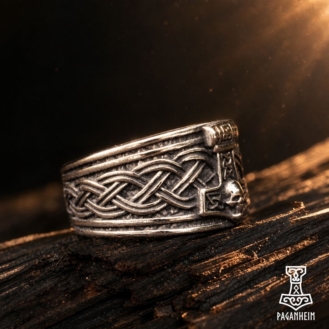 Ring featuring Thor’s hammer Mjölnir with skull motif and interwoven knotwork design