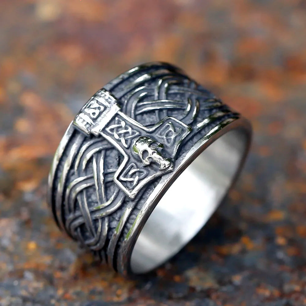 Close-up of Mjölnir crown with skull and Wyrd symbols on ring