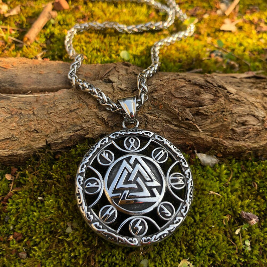 A hollowed masterpiece - Rune Encircled Valknut Amulet adorned with ancient Norse symbols