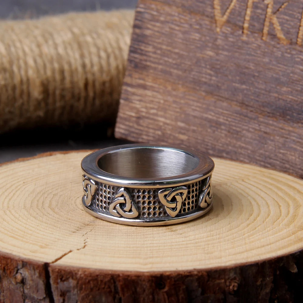 Detailed view of a Celtic Pagan ring made from stainless steel, featuring meticulously engraved Triquetra symbols.