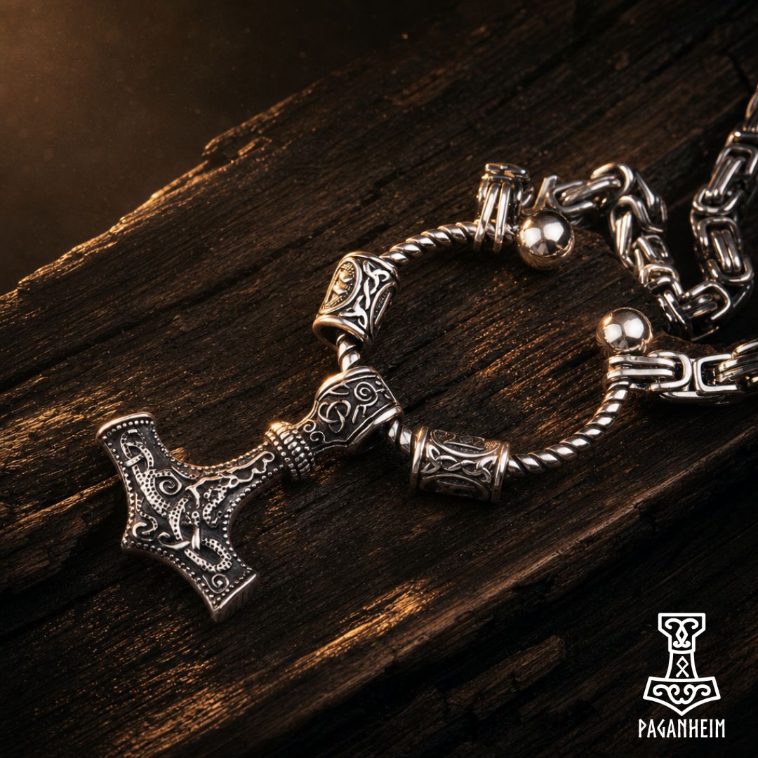 Closeup of Mammen Mjölnir pendant showing detailed Norse patterns