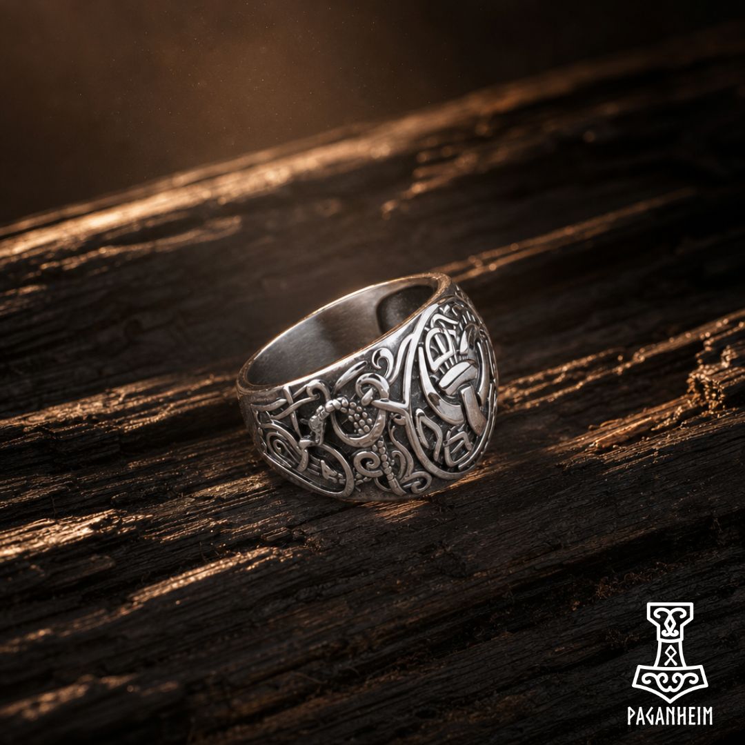Closeup of Triskele ring showing detailed Horns of Odin design