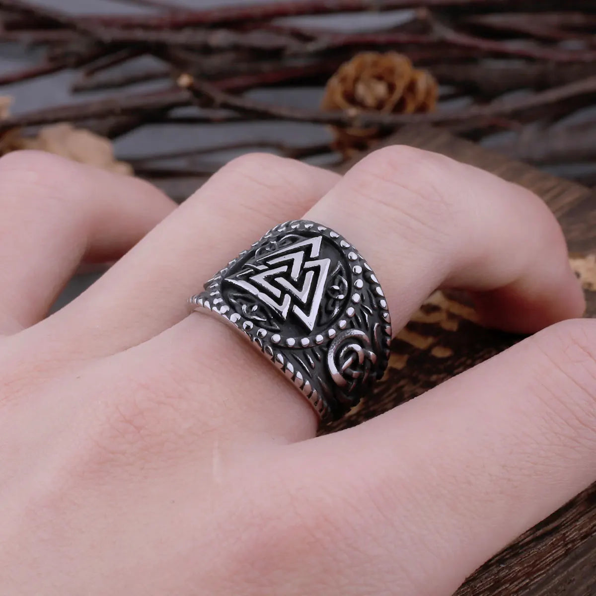 Stainless steel Valknut ring with darkened finish and Norse engravings