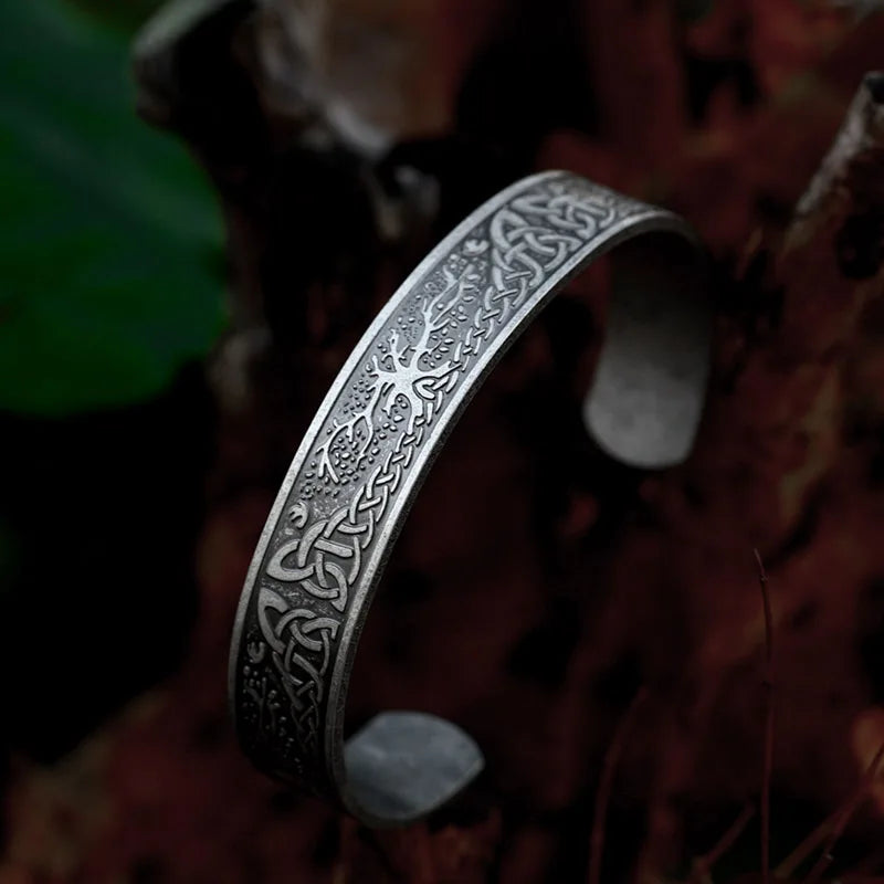 Yggdrasil and Celtic knotwork bangle, stainless steel material.