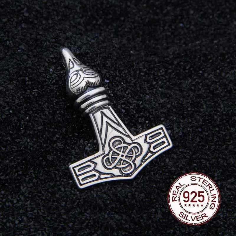 Sterling silver Mjölnir pendant with Celtic Knot and raven head filigree.