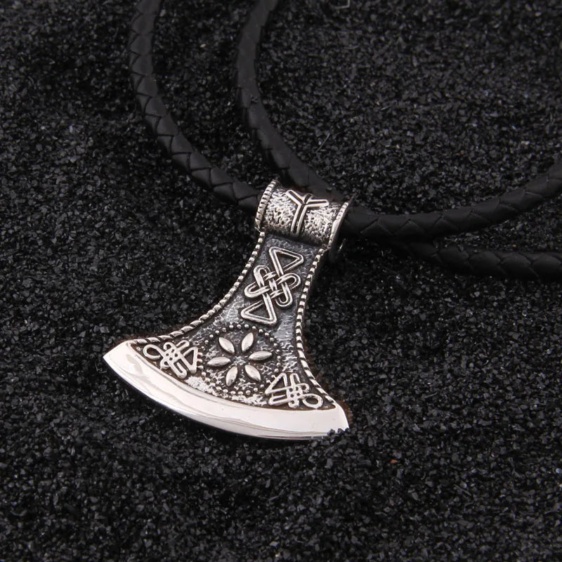 Silver axe pendant with Vegvísir and Sowilo rune engraved.