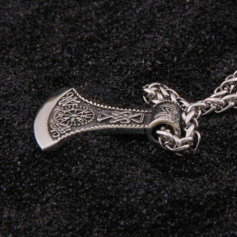 "Sterling silver Norse axe pendant with Vegvísir and Viking motifs.