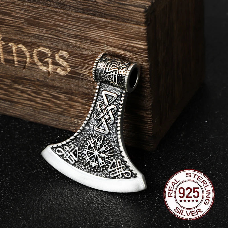 Sterling silver axe pendant with Sowilo rune and Vegvísir symbol.