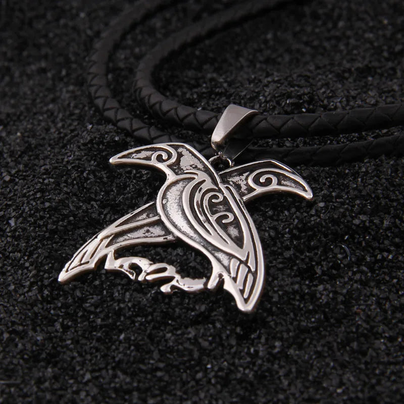 Viking-inspired sterling silver Hugin and Munin pendant necklace.