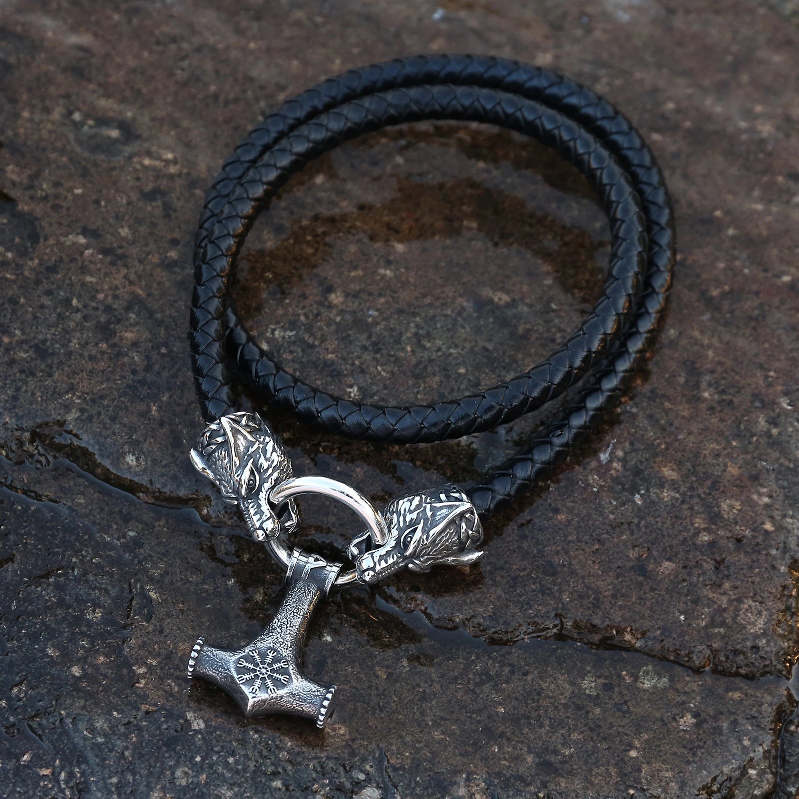 Thor's hammer amulet featuring Helm of Awe and Norse rune