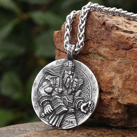 Channel the thunderous might of Thor with our Thor & Mjölnir amulet, a symbol of strength and protection in Norse mythology, complete with intricate Old Norse artistry.