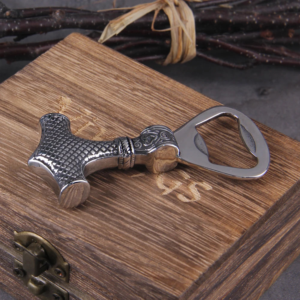 Cast Mjölnir bottle opener with Norse and Celtic details.