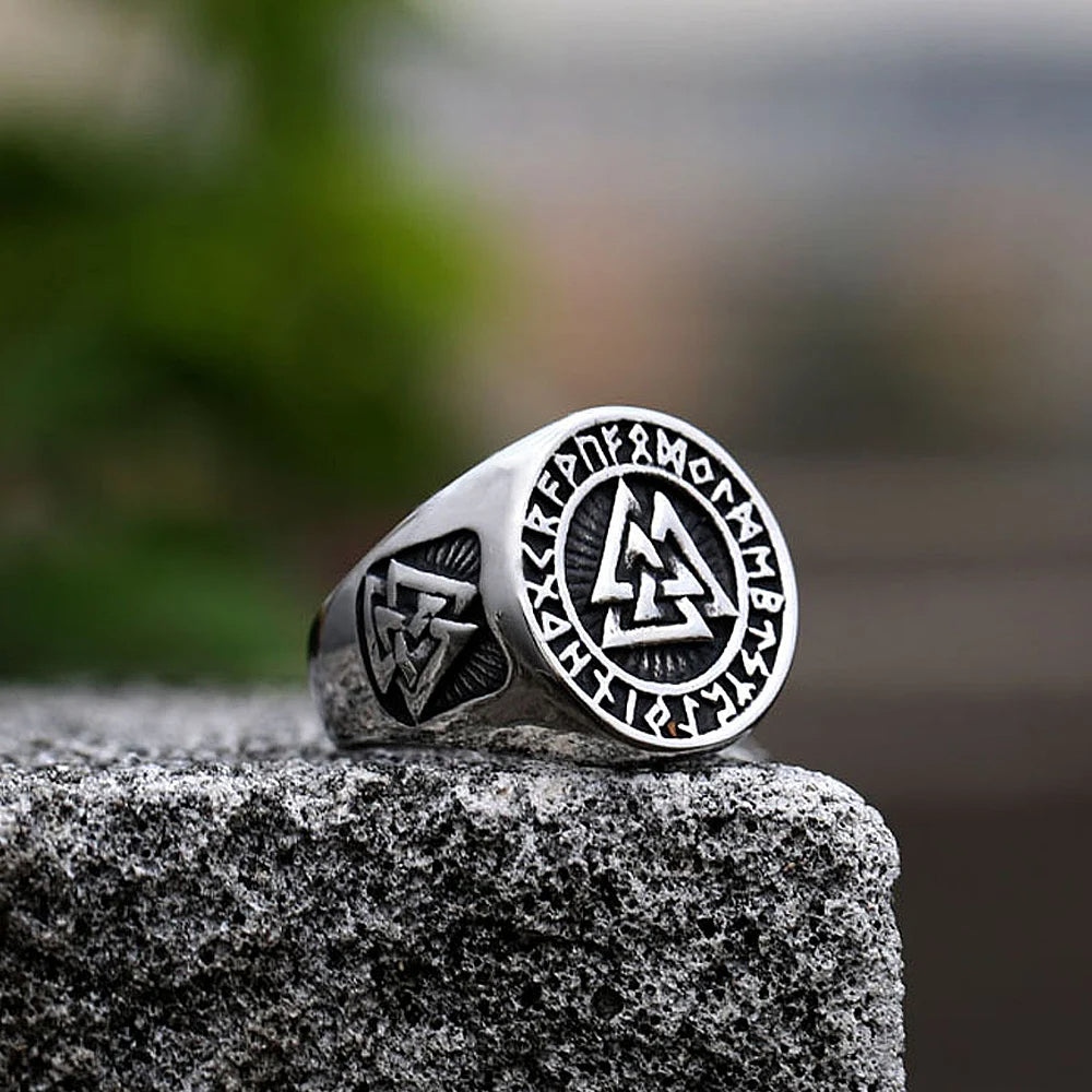 Close-up of a Valknut ring showcasing the engraved Valknut symbol, a timeless emblem of the warrior spirit and afterlife, in silver finish.