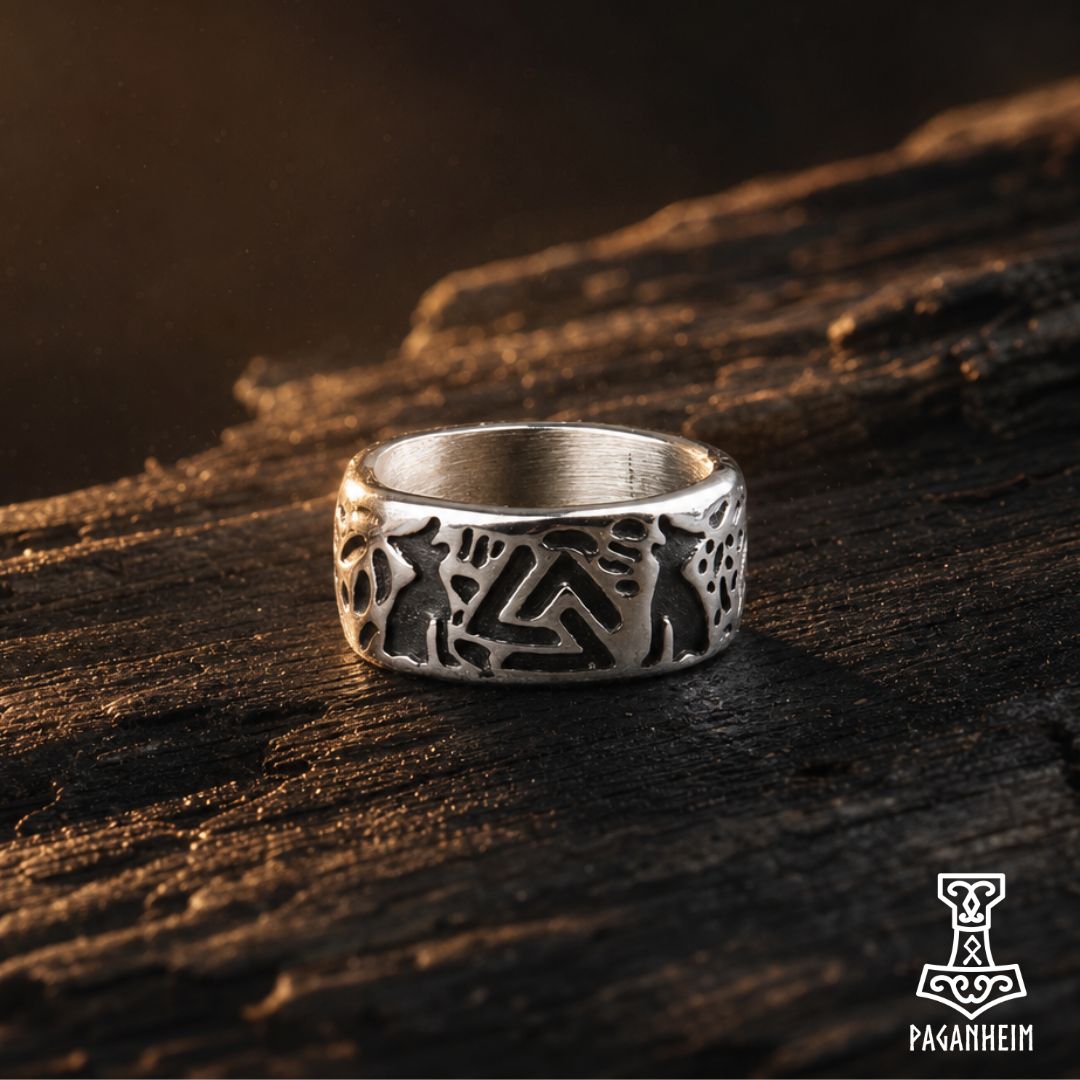 Closeup of Valknut ring showing detailed engravings of Geri and Freki.
