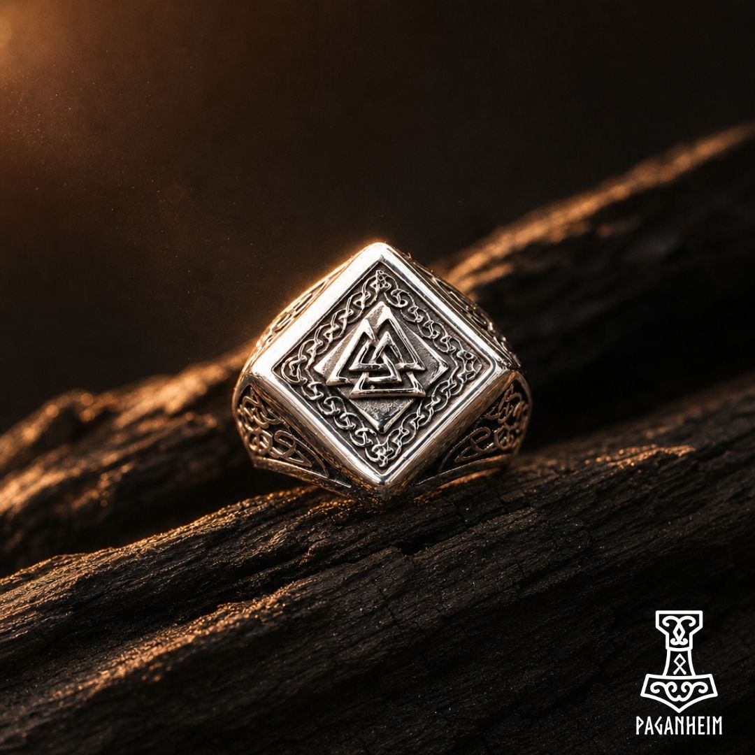 Ring featuring Valknut symbol within tilted square frame and knotwork border