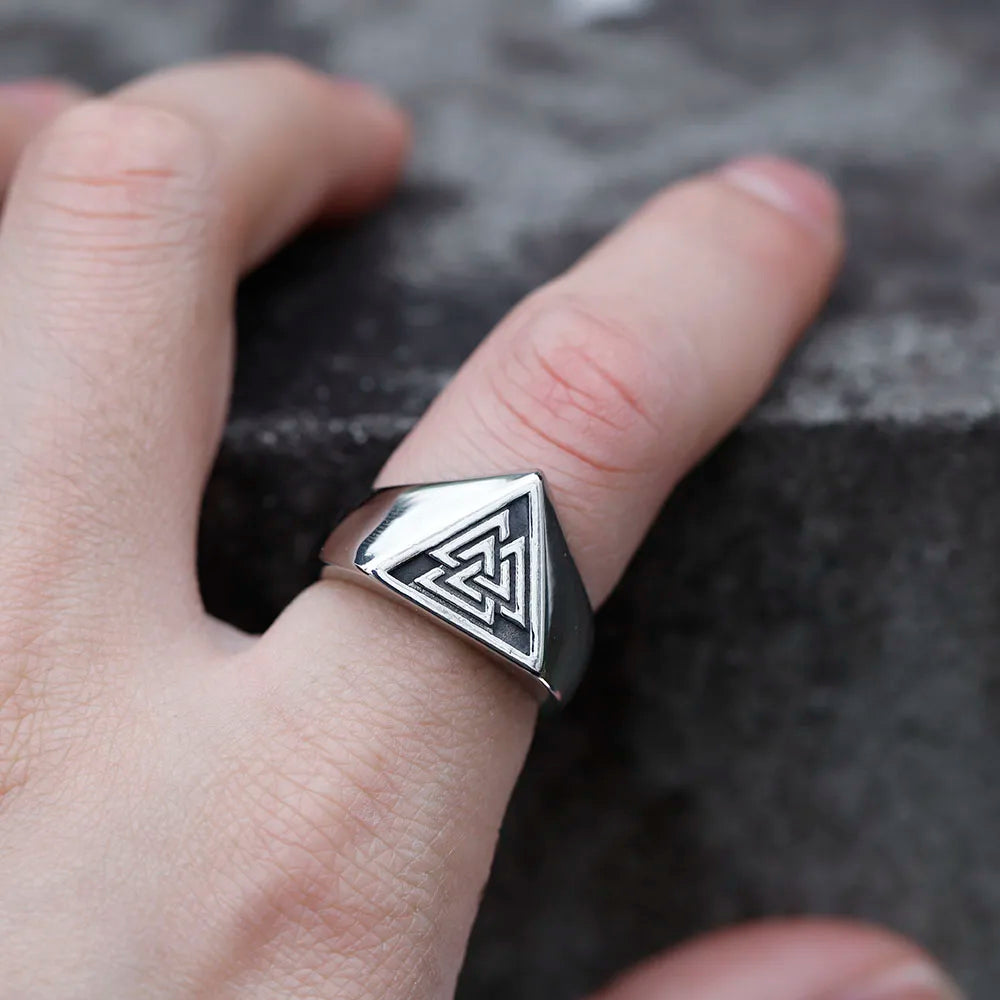 Valknut symbol engraved on a smooth silver-finished ring