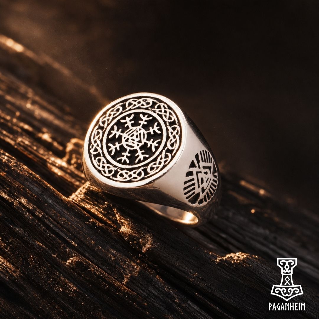 Valknut Ægishjálmr ring resting on stone surface with dark contrast