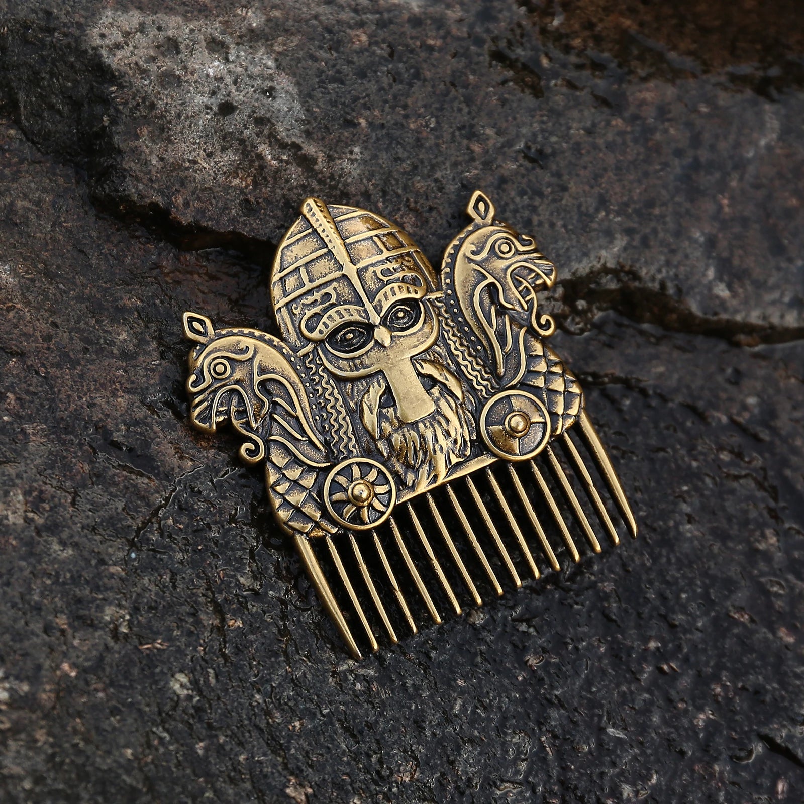 Hair comb with Vendel-era helmet and Viking longship dragon heads.