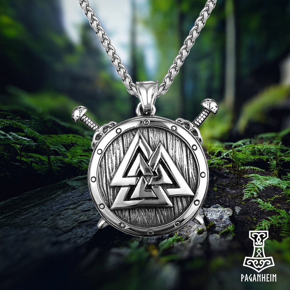 Norse amulet featuring Valknútr symbol on warrior shield.
