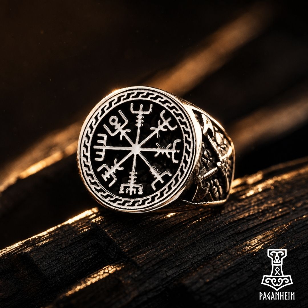 Viking warrior ring with Vegvísir symbol and crossed axes.