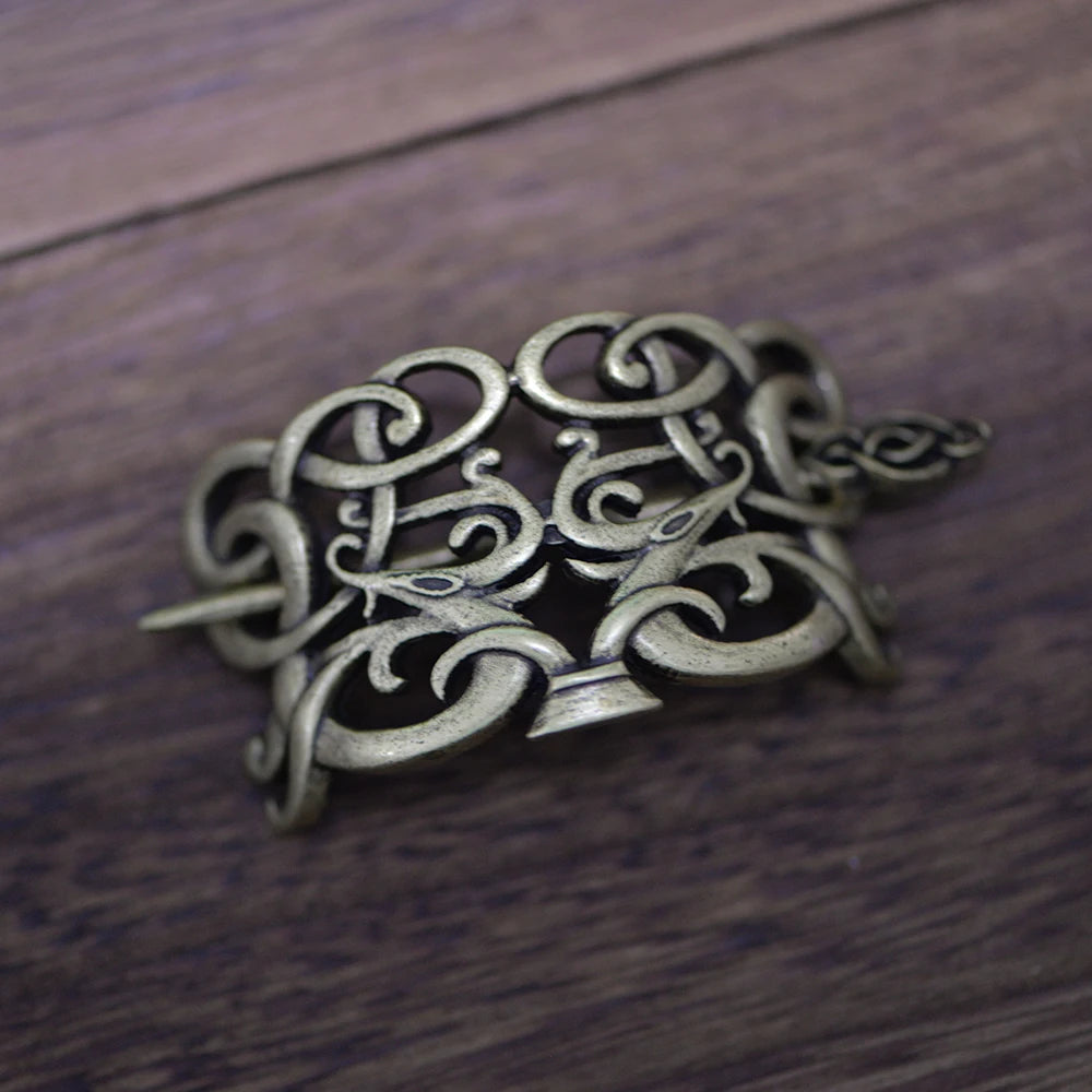 Norse hair pin brooch designed in the Jelling style, reflecting Scandinavian craftsmanship.